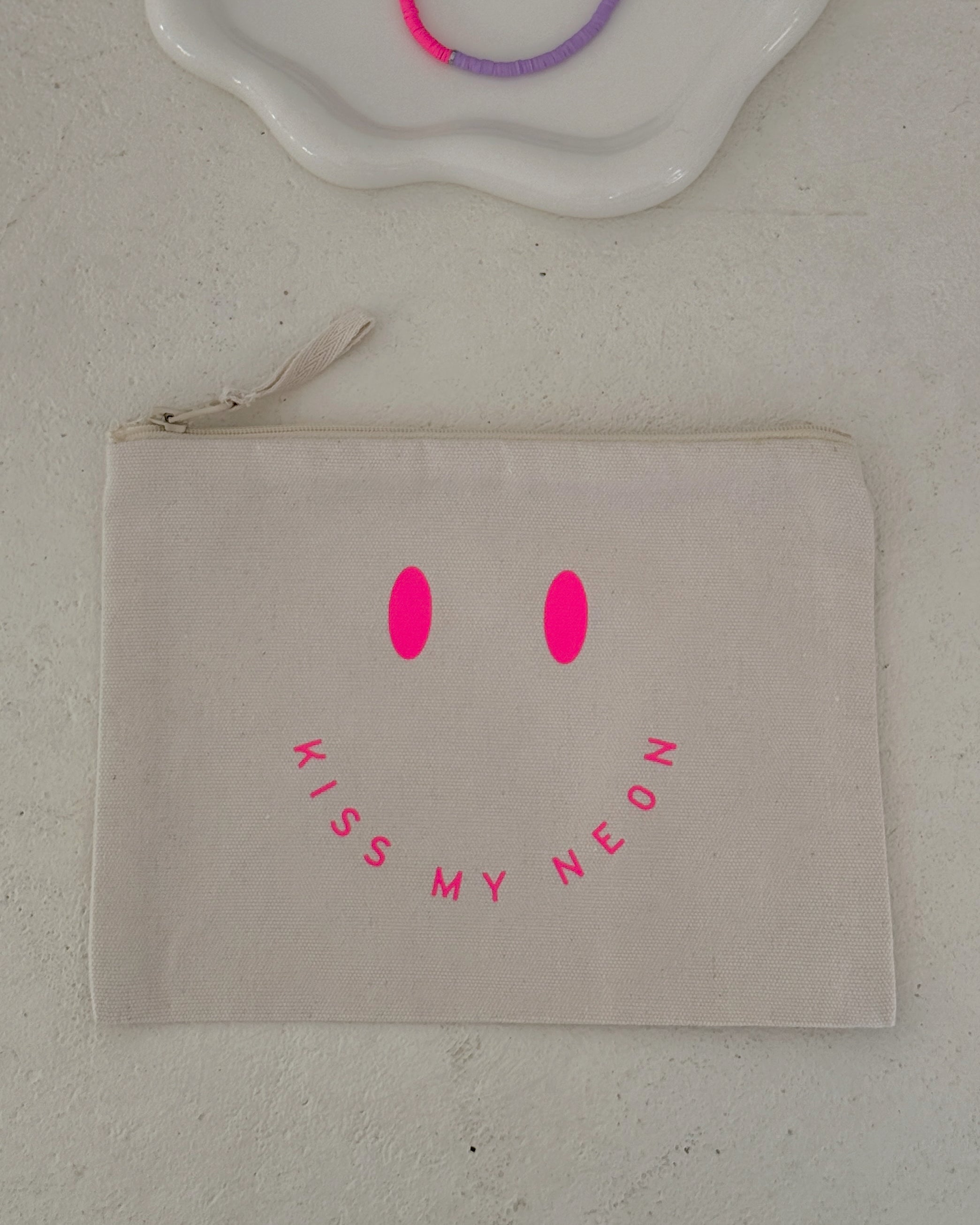 SIGNATURE SMILE Pouch